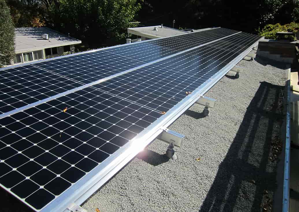 Slideshow of installations on clay tile, metal seam, wood shake, composition and flat roofs