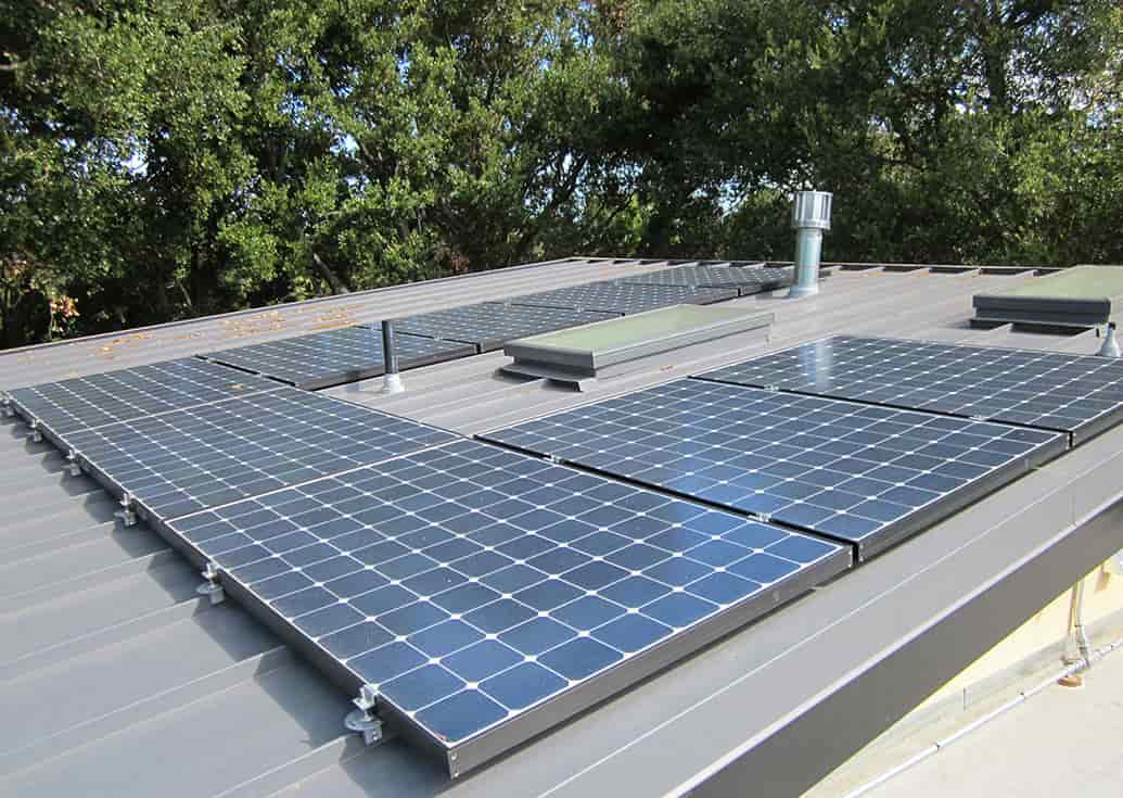 Slideshow of installations on clay tile, metal seam, wood shake, composition and flat roofs