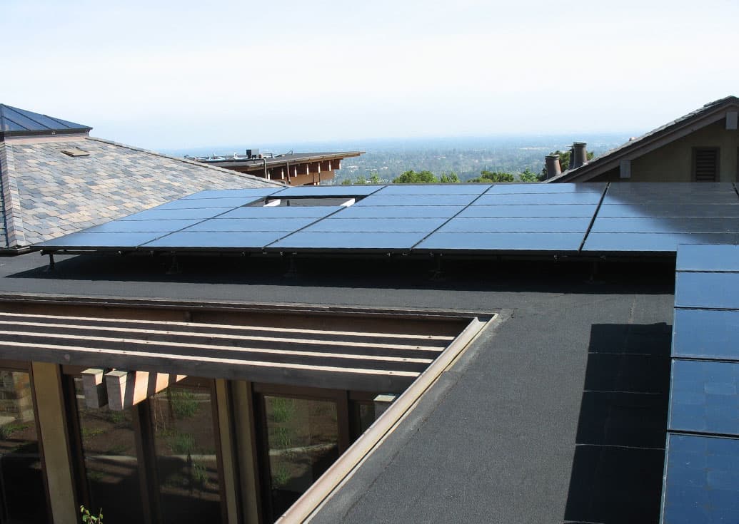 Slideshow of installations on clay tile, metal seam, wood shake, composition and flat roofs