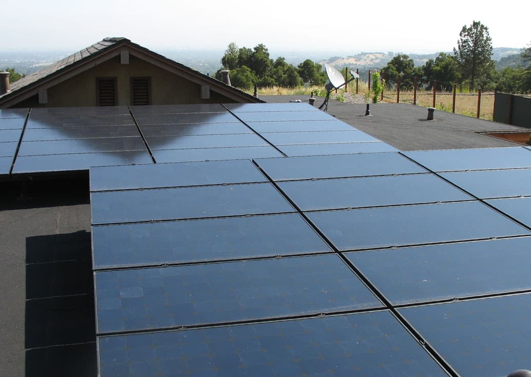 Slideshow of installations on clay tile, metal seam, wood shake, composition and flat roofs