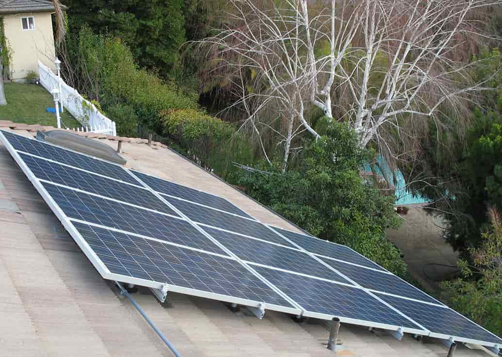Slideshow of installations on clay tile, metal seam, wood shake, composition and flat roofs