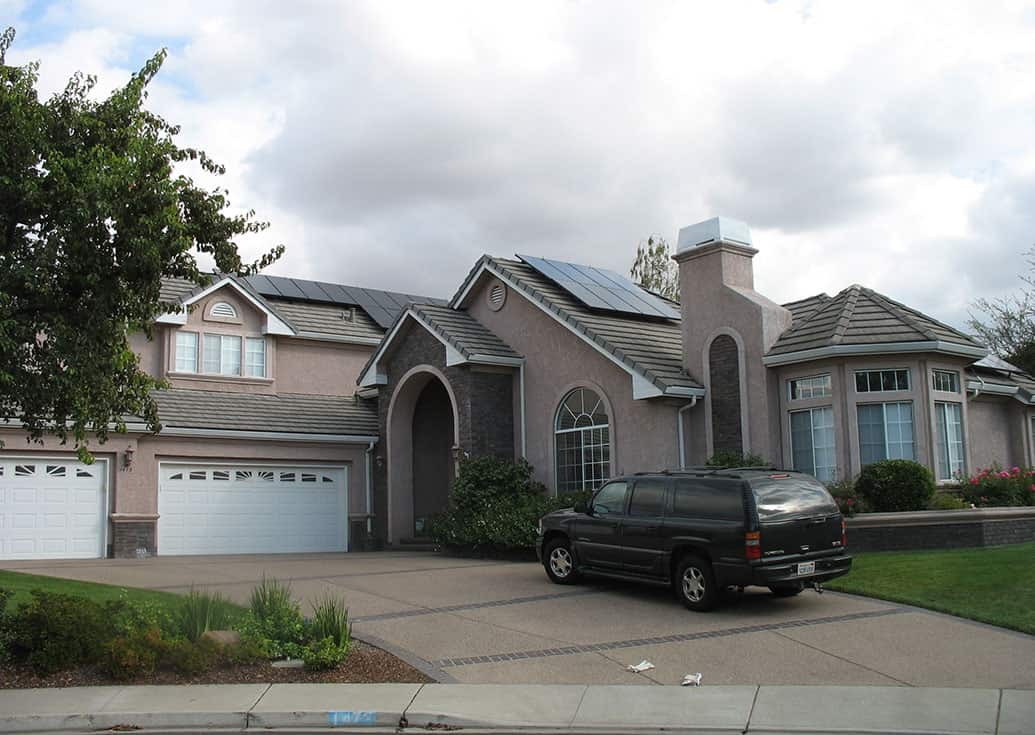 Slideshow of installations on clay tile, metal seam, wood shake, composition and flat roofs